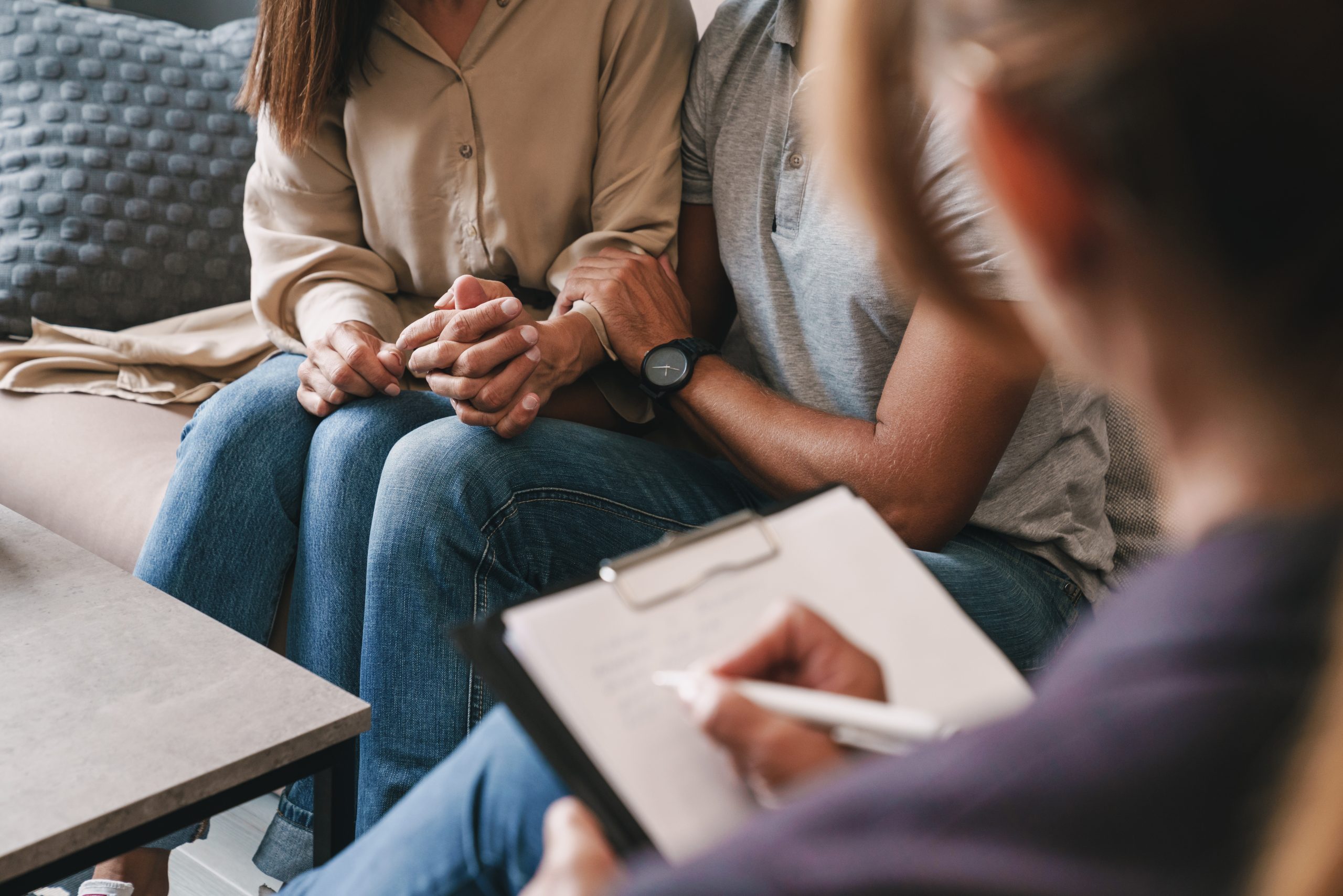 Couple Discussing a prenuptial agreement with a solicitor