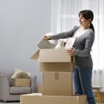 A divorced woman packing boxes