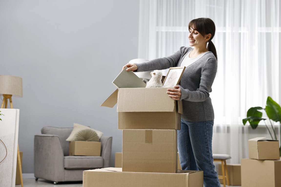 A divorced woman packing boxes